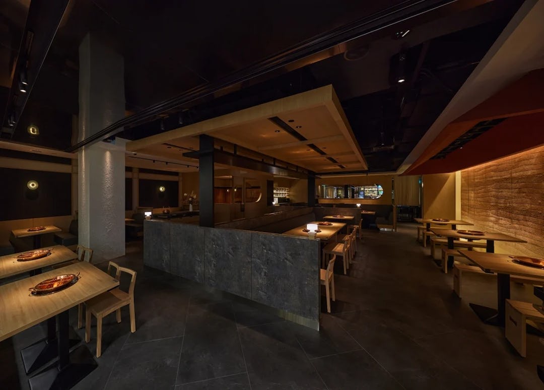 Fried rice and bowls on table.